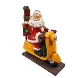 Figurka świąteczna święty Mikołaj z prezentami na motorze 30cm